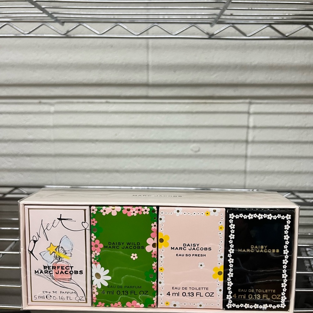 Marc Jacobs Perfume Collection with Green, Pink, and Black Accents
